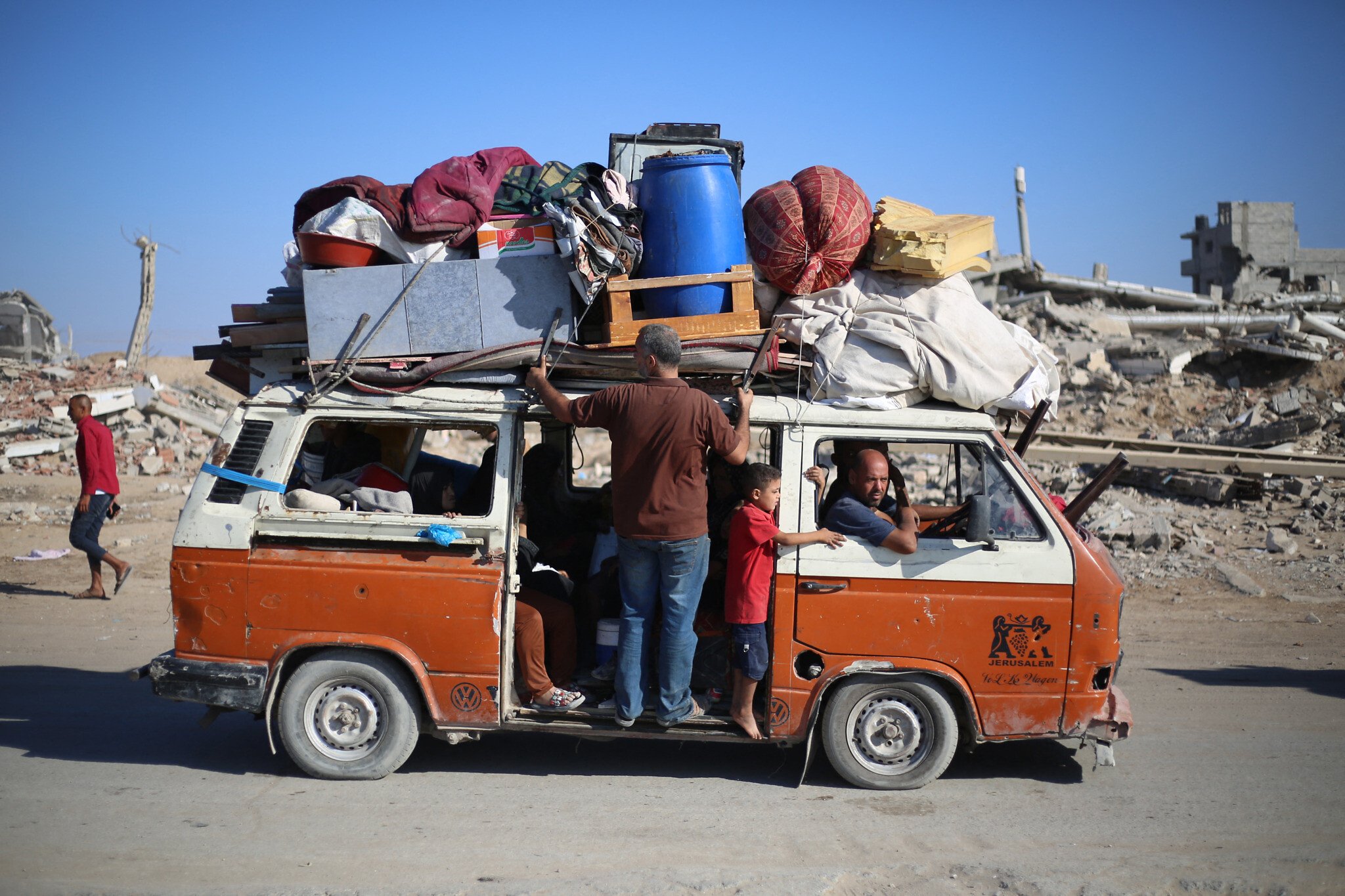NextImg:With tents and transport south in short supply, Gazans flee bombs into the unknown