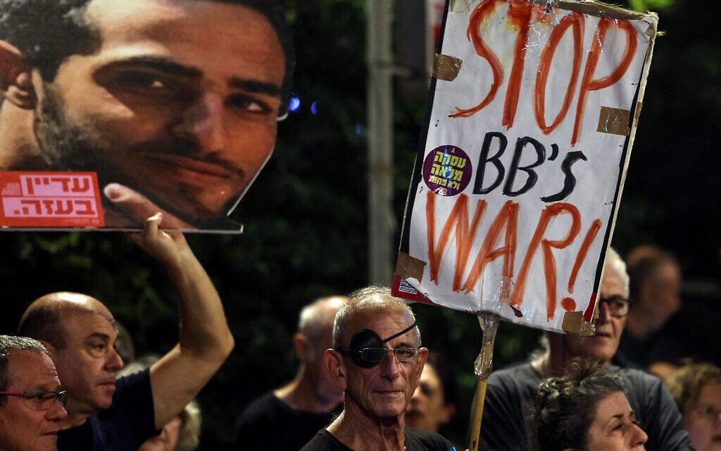 Relatives of hostages and demonstrators take part in a protest calling for action to secure their release in front of the prime minister's residence in Jerusalem, on September 16, 2025. (Photo by Ahmad GHARABLI / AFP)