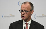 German Chancellor Friedrich Merz addresses guests during a Central Council of Jews in Germany (Zentralrat der Juden in Deutschland) Rosh Hashana reception, on the occasion of its 75th anniversary, on September 17, 2025, at the Jewish Museum in Berlin. (John MACDOUGALL / AFP)