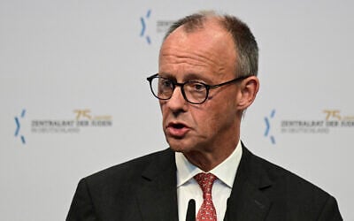 German Chancellor Friedrich Merz addresses guests during a Central Council of Jews in Germany (Zentralrat der Juden in Deutschland) Rosh Hashana reception, on the occasion of its 75th anniversary, on September 17, 2025, at the Jewish Museum in Berlin. (John MACDOUGALL / AFP)