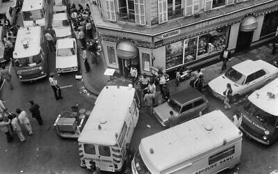 Firemen and rescuers in Paris's Rue des Rosiers after the French-Jewish delicatessen restaurant Jo Goldenberg was attacked on August 9, 1982, by terrorists who threw a grenade into the restaurant and shot at customers with sub-machine guns, killing six customers and injuring 22 others. (Jacques DEMARTHON / AFP)