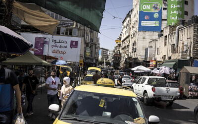 Vehicles move through congested traffic along a main street in Ramallah in the  West Bank on September 22, 2025. (JOHN WESSELS / AFP)