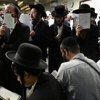 Hasidic Jewish pilgrims pray ahead of Rosh Hashanah, the Jewish new year, at the tomb of Rabbi Nachman of Bratslav (1772-1810) in Uman, central Ukraine, on September 22, 2025. (Genya SAVILOV / AFP)