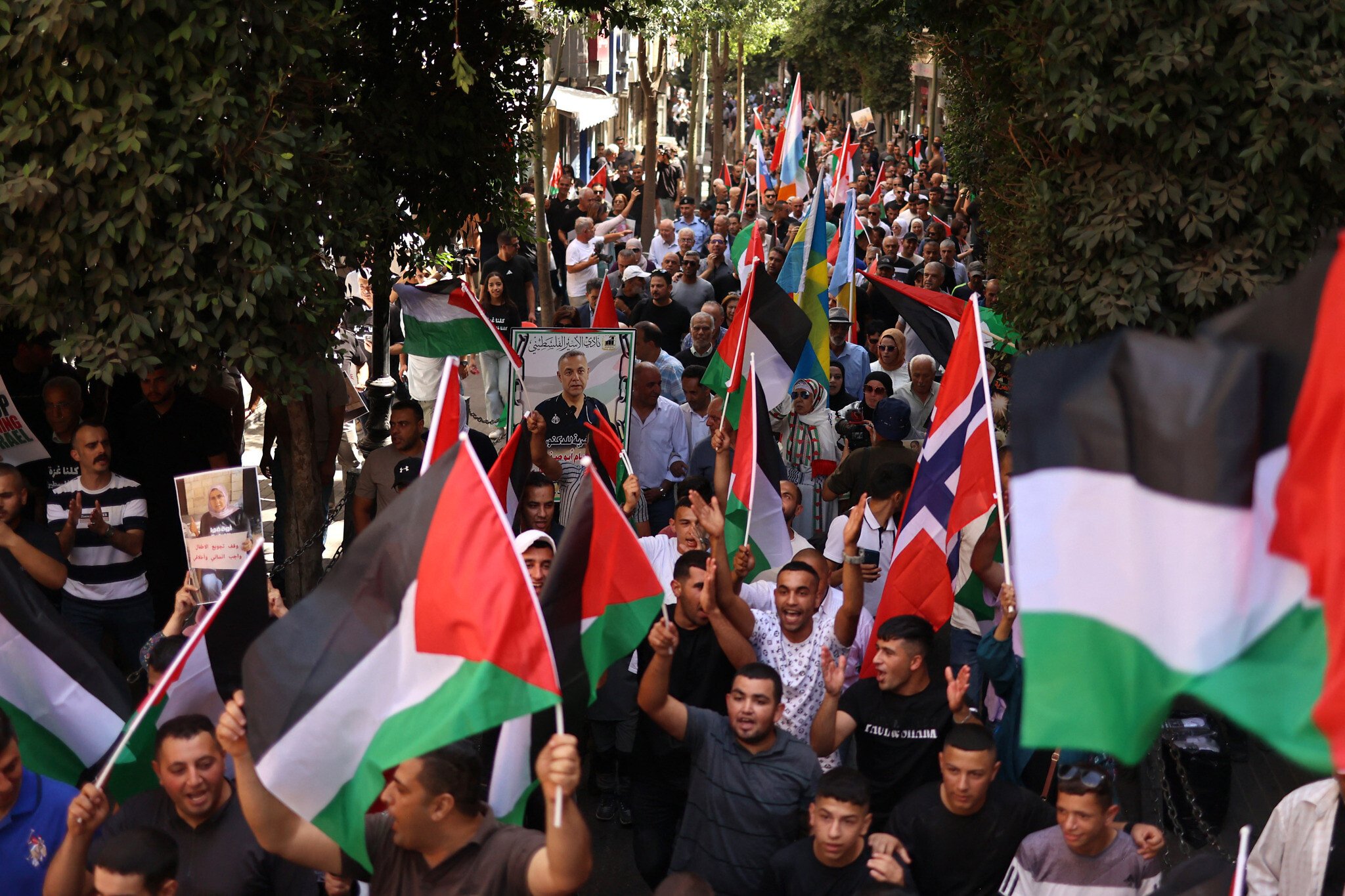 Palestinians rally in West Bank to celebrate statehood recognition, demand ‘action’