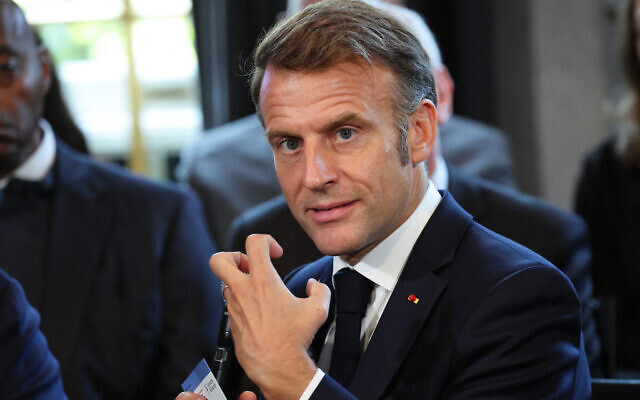 French President Emmanuel Macron speaks to students during an event about the LaFayette scholarship program, in New York City, on September 23, 2025. (Ludovic MARIN / AFP)