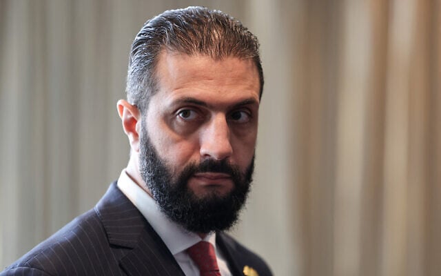 Syrian President Ahmed al-Sharaa waits to meet with France's President Emmanuel Macron on the sidelines of the United Nations General Assembly at the UN headquarters in New York City, on September 24, 2025. (Ludovic MARIN / POOL / AFP)