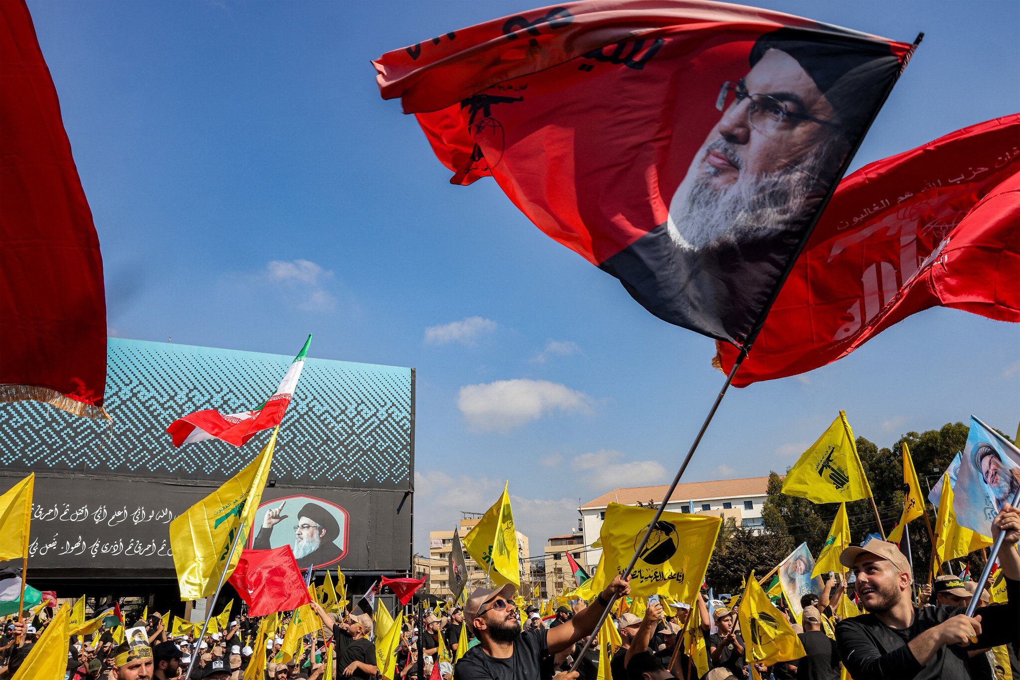 Hezbollah chief resists call to disarm as thousands mark year since Nasrallah’s death