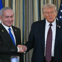 US President Donald Trump and Prime Minister Benjamin Netanyahu shake hands at the conclusion of a joint press conference in the State Dining Room of the White House in Washington, DC on September 29, 2025. (ANDREW CABALLERO-REYNOLDS / AFP)