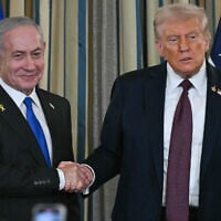 US President Donald Trump, right, and Prime Minister Benjamin Netanyahu shake hands at the conclusion of a joint press conference in the White House State Dining Room in Washington, September 29, 2025. (Andrew Caballero-Reynolds / AFP)