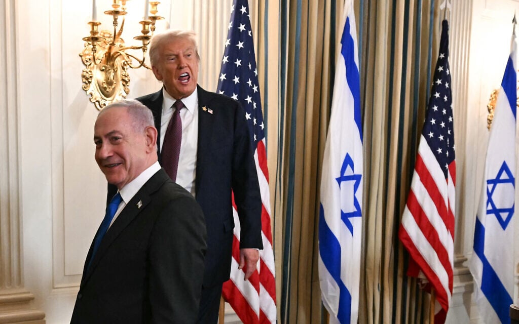 US President Donald Trump and Prime Minister Benjamin Netanyahu depart at the conclusion of a joint press conference in the State Dining Room of the White House in Washington, DC, on September 29, 2025. (Jim WATSON / AFP)