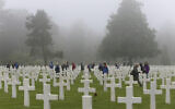 Schoolchildren visit the Colleville American military cemetery, in Colleville sur Mer, western France, June 6, 2018, on the 74th anniversary of the D-Day landing. (AP Photo/David Vincent)
