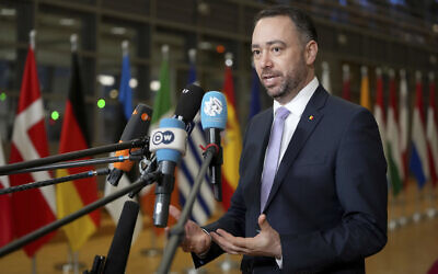 Belgium's Foreign Minister Maxime Prevot speaks with the media as he arrives for a meeting of EU foreign ministers at the European Council building in Brussels, February 24, 2025. (AP Photo/Virginia Mayo)