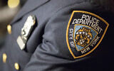 Illustrative: A badge of the New York City police department, June 29, 2017, in New York. (AP Photo/Mary Altaffer, File)