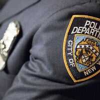 Illustrative: A badge of the New York City police department, June 29, 2017, in New York. (AP Photo/Mary Altaffer, File)