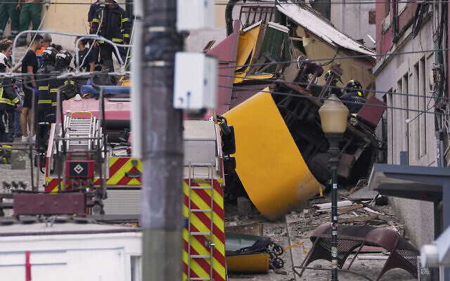 Emergency teams work at the site of a derailed electric streetcar in Lisbon, Portugal, Wednesday, Sept. 3, 2025. (AP Photo/Armando Franca) Emergency teams work at the site of a derailed electric streetcar in Lisbon, Portugal, Wednesday, Sept. 3, 2025. (AP Photo/Armando Franca)