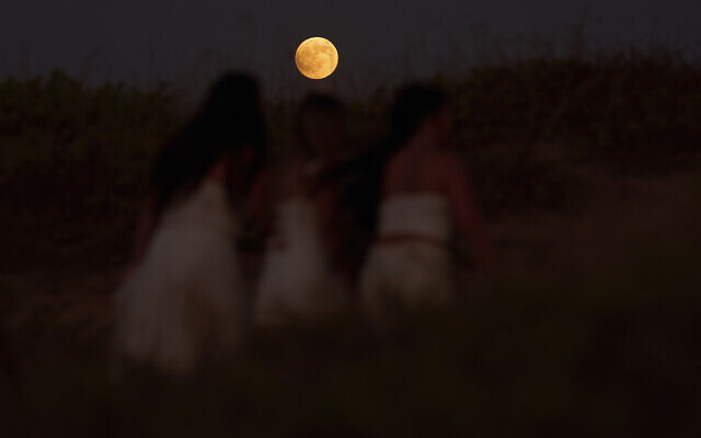A blood moon rises ahead of a lunar eclipse in Hadera, Sept. 7, 2025. (AP/Ariel Schalit) A blood moon rises ahead of a lunar eclipse in Hadera, Sept. 7, 2025. (AP/Ariel Schalit)