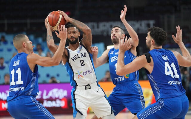 From left, Israel's Yam Madar, Greece's Tyler Dorsey, Israel's Bar Timor, Israel's Tomer Ginat in action during the Eurobasket, European Basketball Championship round of 16 match between Greece and Israel at the Riga Arena in Riga, Latvia, Sept. 7, 2025. (AP/Sergei Grits) From left, Israel's Yam Madar, Greece's Tyler Dorsey, Israel's Bar Timor, Israel's Tomer Ginat in action during the Eurobasket, European Basketball Championship round of 16 match between Greece and Israel at the Riga Arena in Riga, Latvia, Sept. 7, 2025. (AP/Sergei Grits)