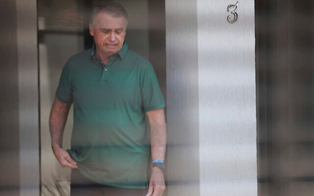Brazil's former president Jair Bolsonaro stands at the entrance of his home where he is under house arrest in Brasilia, Brazil, September 11, 2025. (AP Photo/Luis Nova) Brazil's former president Jair Bolsonaro stands at the entrance of his home where he is under house arrest in Brasilia, Brazil, September 11, 2025. (AP Photo/Luis Nova)