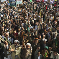 Houthi supporters chant slogans during a weekly anti-Israel rally in Sanaa, Yemen, September 12, 2025. (AP Photo/Osamah Abdulrahman)