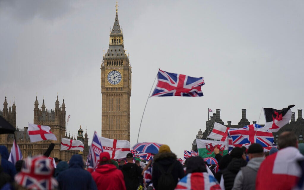 Demonstrators take part in the Tommy Robinson-led Unite the Kingdom march and rally near Westminster, London, September 13, 2025. (Joanna Chan/AP) Demonstrators take part in the Tommy Robinson-led Unite the Kingdom march and rally near Westminster, London, September 13, 2025. (Joanna Chan/AP)