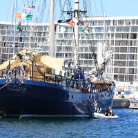 A ship that is part of the Global Sumud Flotilla prepares to depart to Gaza to deliver aid amidst Israel's blockade on the Palestinian territory, in the Tunisian port of Bizerte, September 13, 2025. (AP/Anis Mili)