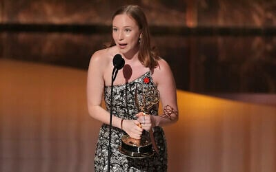 Hannah Einbinder accepts the award for outstanding supporting actress in a comedy series for 'Hacks' during the 77th Primetime Emmy Awards on September 14, 2025, at the Peacock Theater in Los Angeles, California. (AP Photo/Chris Pizzello)