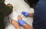 Illustration: A baby receives the measles vaccine on September 10, 2025, in Seattle, Washington. (AP/Lindsey Wasson)