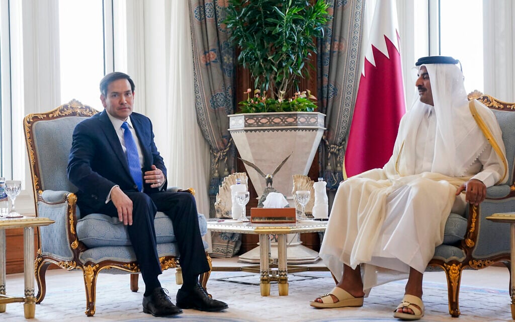 US Secretary of State Marco Rubio, left, meets Qatar's Emir Sheikh Tamim bin Hamad Al Thani at Amiri Diwan, in Doha, Qatar, Tuesday, Sept. 16, 2025. (Nathan Howard/Pool Photo via AP)