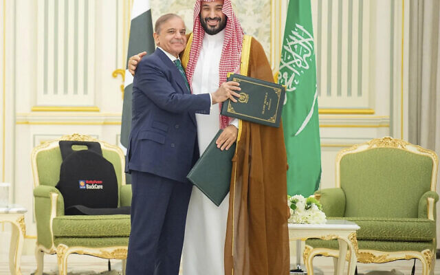 Pakistani Prime Minister Shehbaz Sharif, left, embraces Saudi Arabia's Crown Prince Mohammed bin Salman after signing a joint defense pact in Riyadh, Saudi Arabia, September 17, 2025. (Saudi Press Agency via AP)