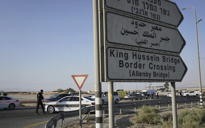 Israeli police stand guard near the site of a shooting attack where two soldiers were killed at the Allenby Bridge Crossing between the West Bank and Jordan, September 18, 2025. (AP Photo/Mahmoud Illean)