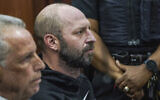 Jeremy Fistel, right, who is suspected of threatening Zohran Mamdani, sits at the defense table during his arraignment in Queens criminal court, in New York, September 18, 2025. (AP Photo/Dean Moses, Pool)
