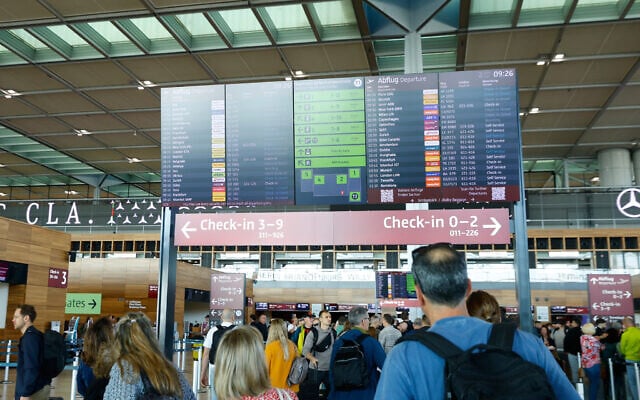 People at BER airport as a cyber attack has caused delays, in Berlin, Germany, Saturday, Sept. 20, 2025. (Carsten Koall/dpa via AP) People at BER airport as a cyber attack has caused delays, in Berlin, Germany, Saturday, Sept. 20, 2025. (Carsten Koall/dpa via AP)