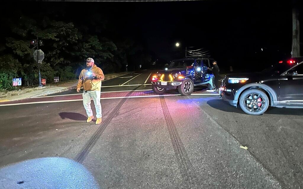 Police block a road to a country club where a shooting happened at Sky Meadow Country Club in Nashua, New Hampshire, Saturday, Sept. 20, 2025. (AP/Michael Casey)