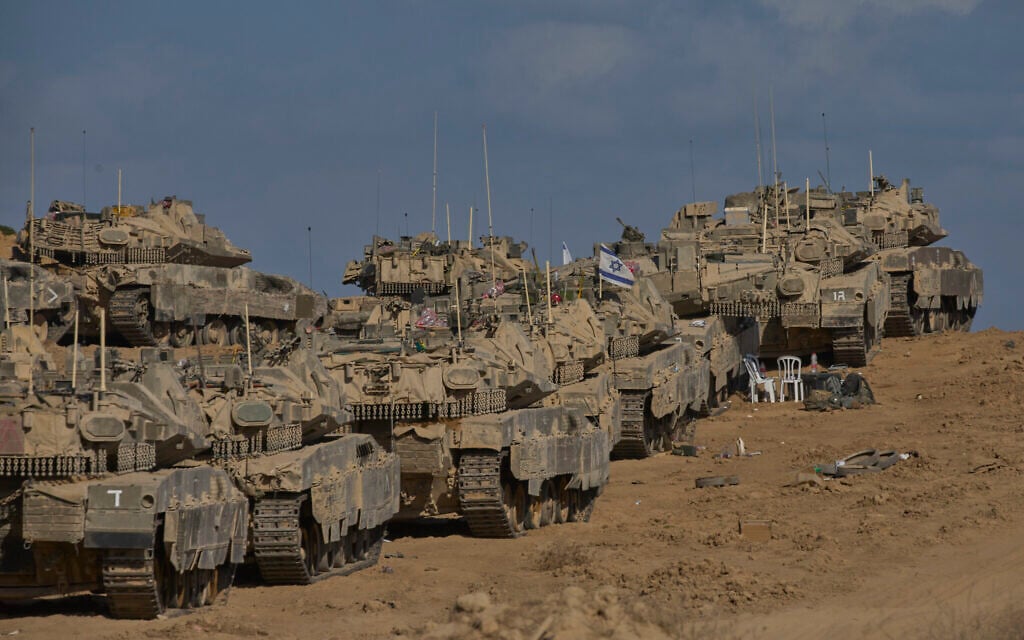 Israeli tanks at a staging area near the border with the Gaza Strip, in southern Israel, Sunday, Sept. 21, 2025. (AP/Ohad Zwigenberg)