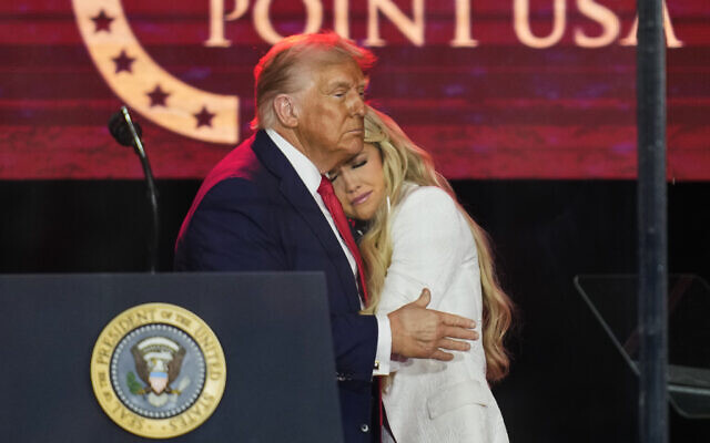 US President Donald Trump, left, embraces Erika Kirk at a memorial for her husband, assassinated conservative activist Charlie Kirk, at State Farm Stadium in Glendale, Arizona, September 21, 2025. (AP Photo/John Locher) US President Donald Trump, left, embraces Erika Kirk at a memorial for her husband, assassinated conservative activist Charlie Kirk, at State Farm Stadium in Glendale, Arizona, September 21, 2025. (AP Photo/John Locher)