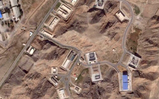 This satellite photo from Planet Labs PBC shows reconstruction efforts at Iran's Parchin solid propellant plant outside of Tehran, Iran, August 28, 2025. (Planet Labs PBC via AP)