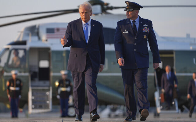 US President Donald Trump walks from Marine One with Col. Christopher Robinson, right, commander of the 89th Airlift Wing, to board Air Force One at Joint Base Andrews, Sept. 22, 2025, at Joint Base Andrews, Maryland (AP Photo/Evan Vucci) US President Donald Trump walks from Marine One with Col. Christopher Robinson, right, commander of the 89th Airlift Wing, to board Air Force One at Joint Base Andrews, Sept. 22, 2025, at Joint Base Andrews, Maryland (AP Photo/Evan Vucci)