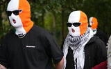 Members of the band Kneecap arrive at Woolwich Crown Court in London on September 26, 2025. (AP/Joanna Chan)