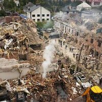 Rescuers work at the site of an apartment building damaged during a Russian attack in Kyiv, Ukraine, September 28, 2025. (AP Photo/Efrem Lukatsky)