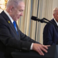 US President Donald Trump listens during a news conference with Prime Minister Benjamin Netanyahu in the State Dining Room of the White House, September 29, 2025, in Washington. (AP Photo/Evan Vucci)