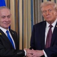 Prime Minister Benjamin Netanyahu (L) shakes hands with US President Donald Trump after a news conference in the State Dining Room of the White House, Washington, DC, September 29, 2025. (AP Photo/ Alex Brandon)