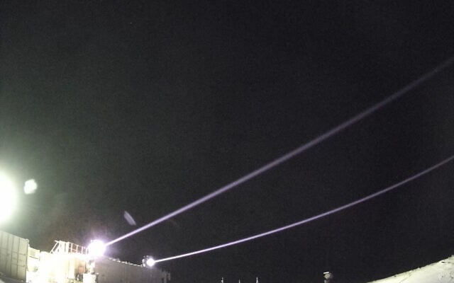 The 'Iron Beam' laser-based air defense system is seen intercepting a target during a test over southern Israel, in a handout photo issued on September 17, 2025. (Defense Ministry)