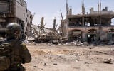 A remote-controlled, explosive-laden IDF M113 APC is seen after being detonated in southern Gaza's Rafah, April 21, 2025. (Emanuel Fabian/Times of Israel)