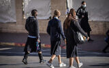 Illustrative: Ultra-Orthodox girls make their way to school in Jerusalem, November 24, 2020. (Yonatan Sindel/Flash90)