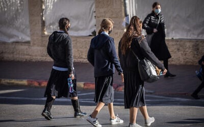Illustrative: Ultra-Orthodox girls make their way to school in Jerusalem, November 24, 2020. (Yonatan Sindel/Flash90) Illustrative: Ultra-Orthodox girls make their way to school in Jerusalem, November 24, 2020. (Yonatan Sindel/Flash90)