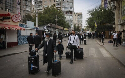 Jewish visitors seen in the street of Uman, ahead of the Jewish holiday of Rosh Hashanah, September 30, 2024. (Chaim Goldberg/ Flash90/ File)