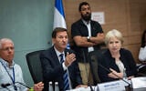 Knesset Foreign Affairs and Defense Committee legal adviser Miri Frenkel Shor (right) and chairman Boaz Bismuth (center) during a discussion on ultra-Orthodox conscription, September 3, 2025. (Yonatan Sindel/Flash90)