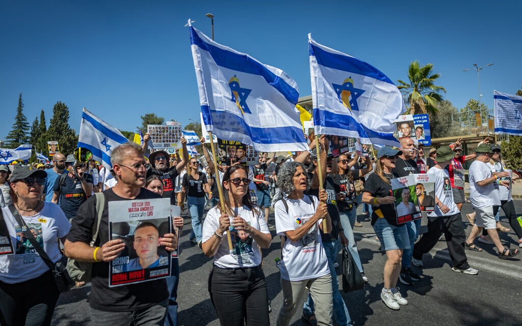 Hostages’ families, supporters march on Netanyahu’s residence ahead of large rally