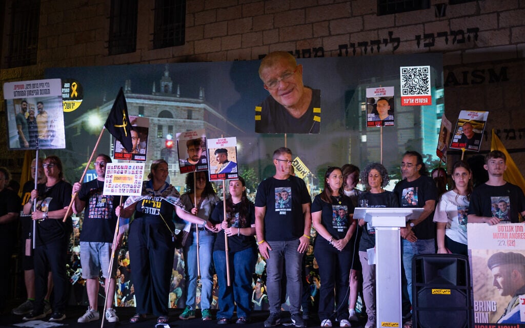 Relatives of hostages stand on stage at a protest in Jerusalem on September 6, 2025. (Yonatan SIndel/FLASH90)