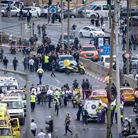 Police and rescue personnel at the scene of a deadly terror attack at Ramot Junction near the entrance to Jerusalem, September 8, 2025 (Chaim Goldberg/FLASH90)